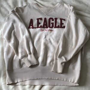 American Eagle Outfitters Cream Sweatshirt with Maroon Lettering
